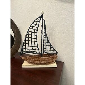 Coastal decorative tabletop accent sailboat woven seagrass hull dark blue sail